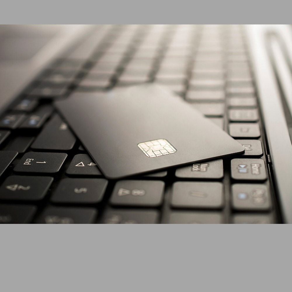 image of a credit card on a keyboard, representative of the Home Equity Line Of Credit service provided by Canadian Mortgage Broker Michelle Campbell